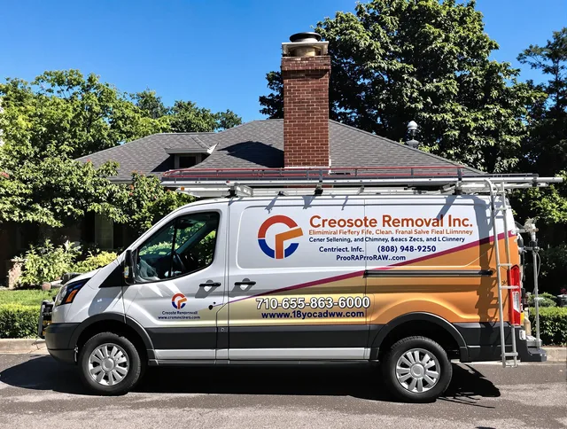 Tiverton Chimney Sweep technician removing creosote safely in Tiverton, RI